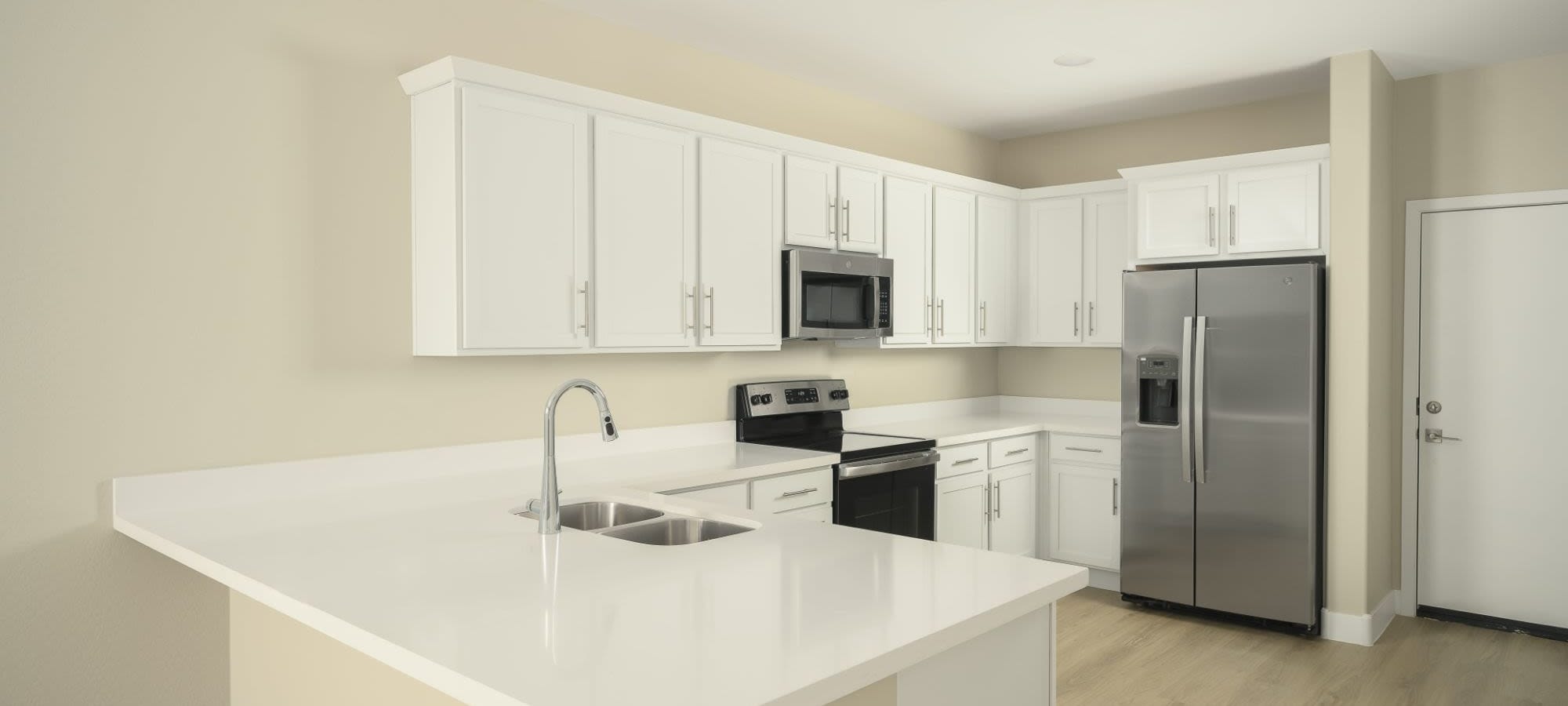 Kitchen with nice counters at Sierra Verde in Surprise, Arizona