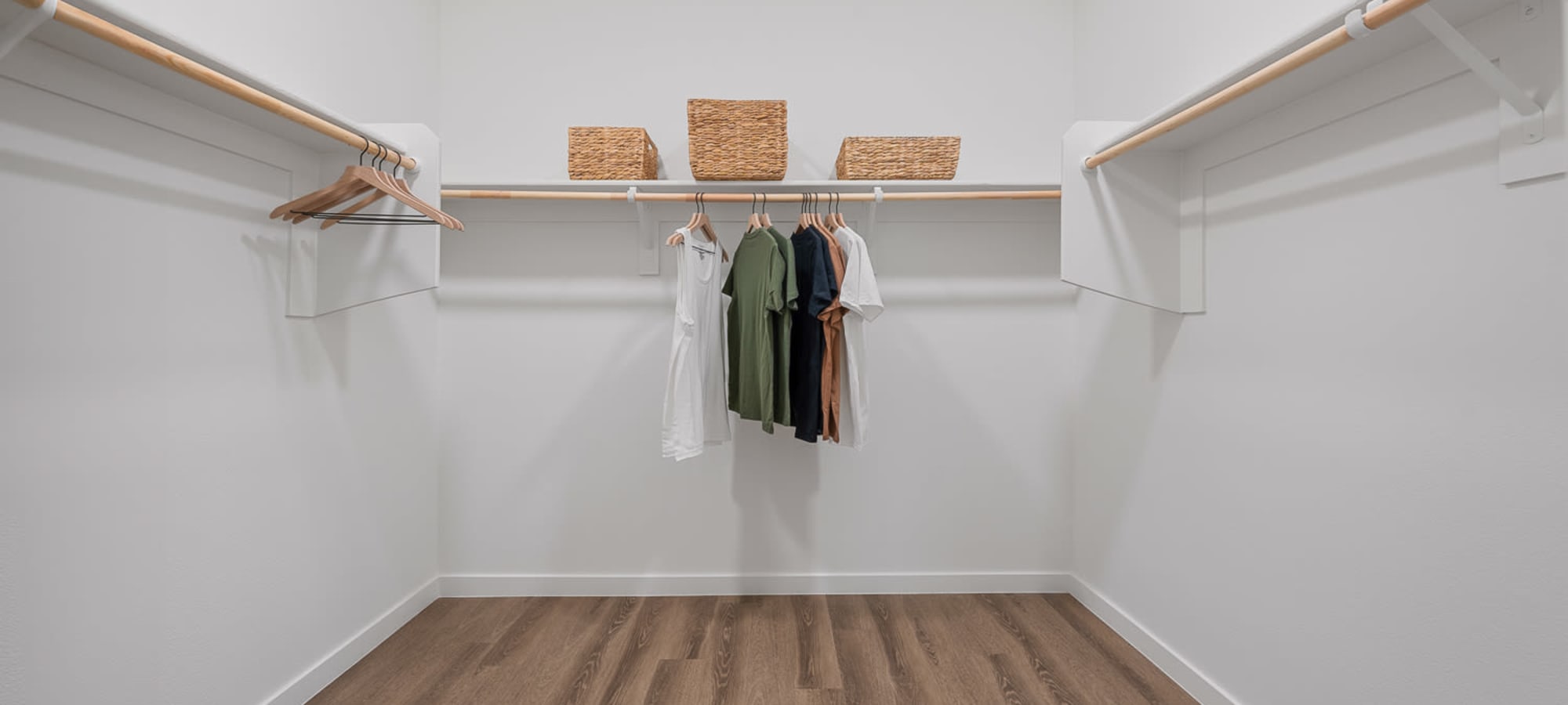 Spacious closet at The M at Shadow Mountain in Phoenix, Arizona features lots of  storage space and room for hanging clothes