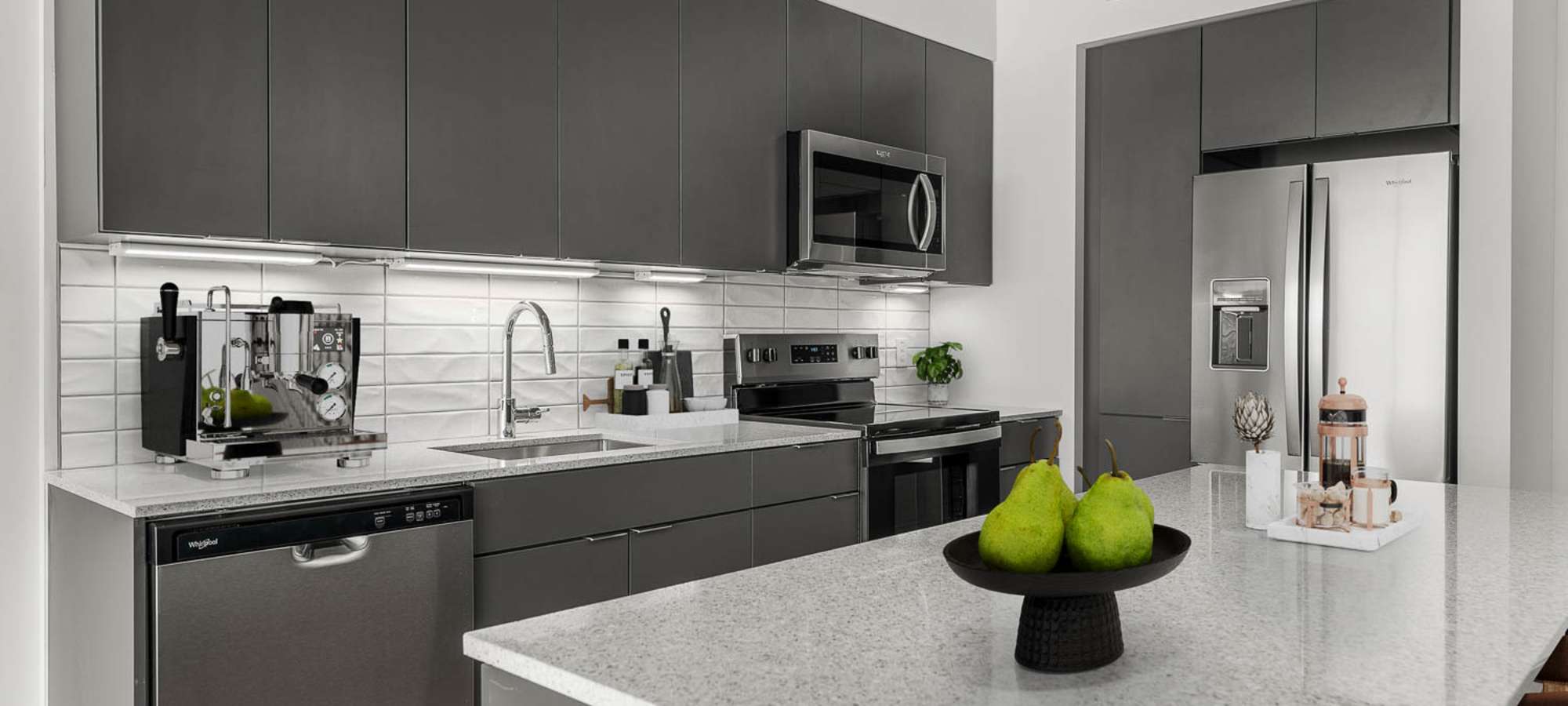 Kitchen island with luxury countertops at PALMtower in Phoenix, Arizona