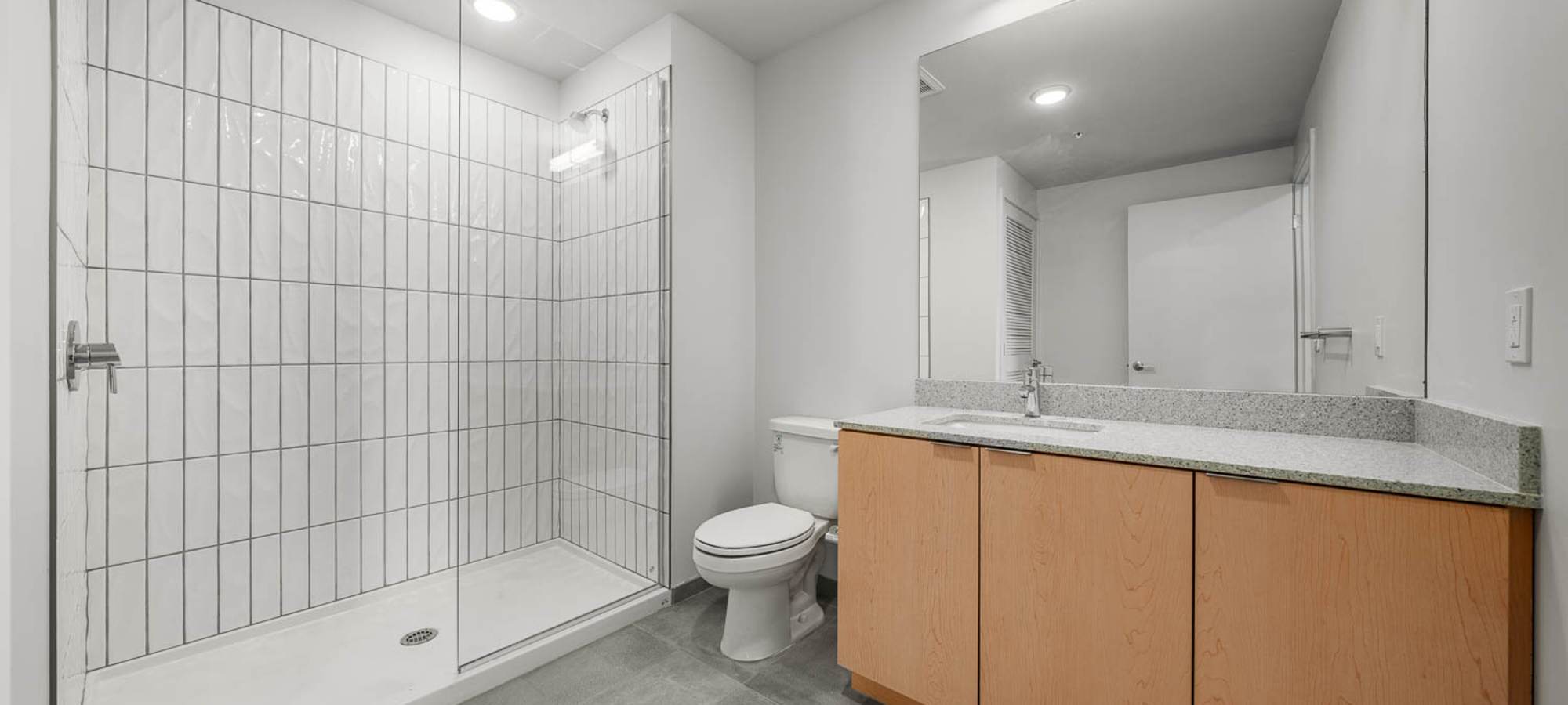 Bathroom with walk in shower at PALMtower in Phoenix, Arizona