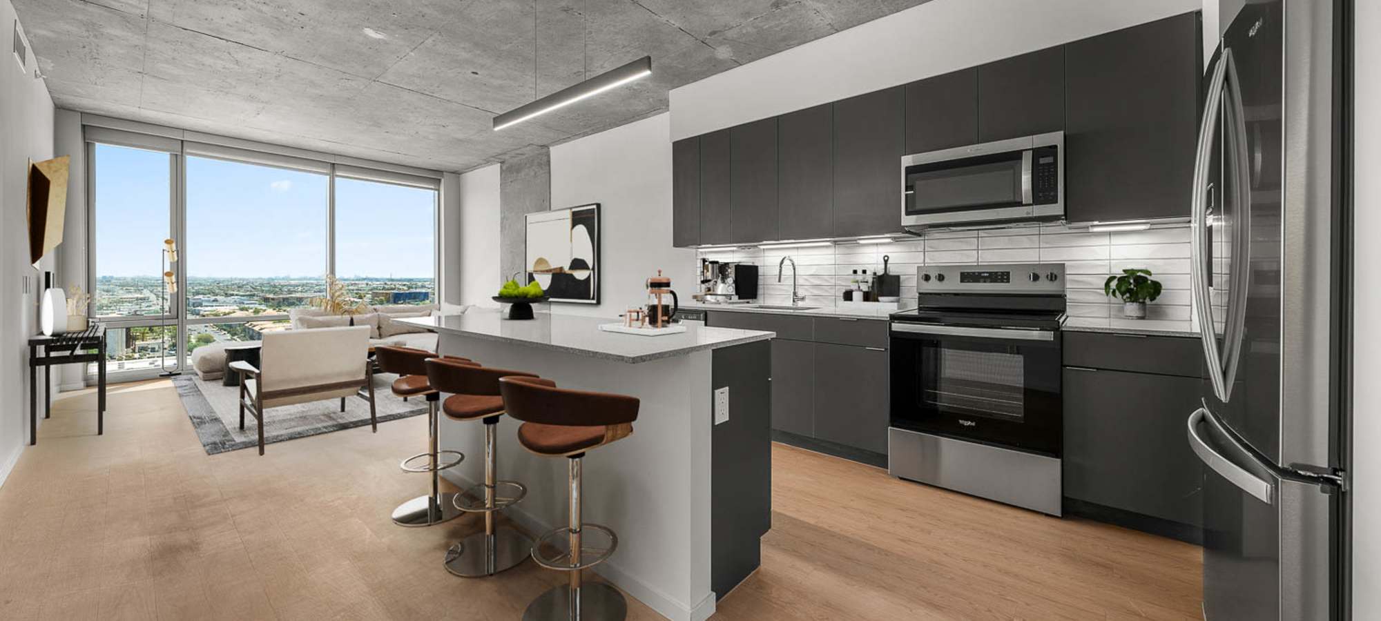 Kitchen with stainless steel appliances at PALMtower in Phoenix, Arizona 
