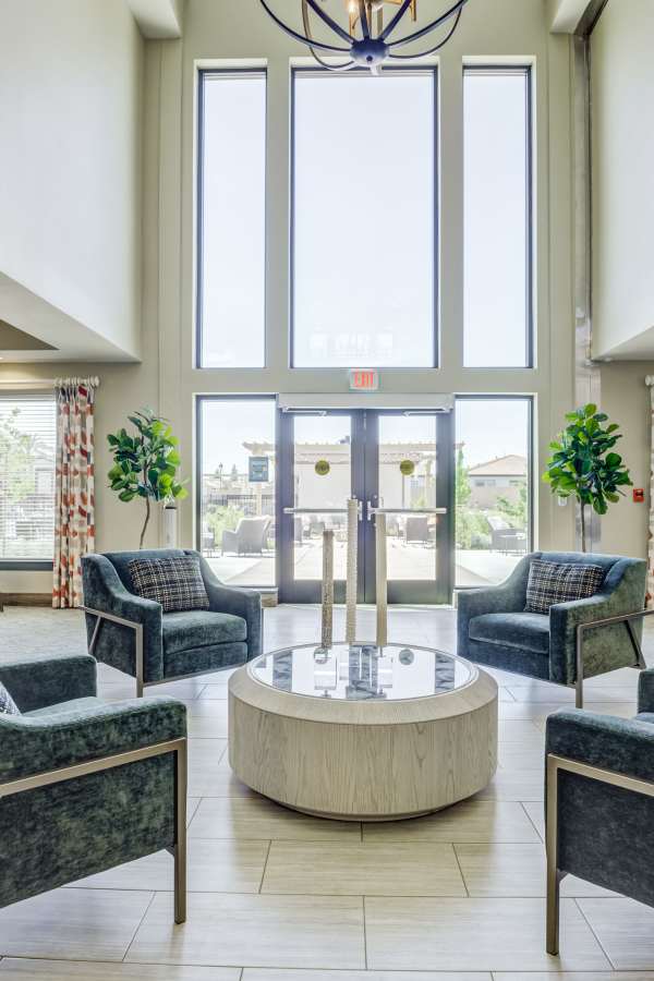 Large windows framing the clubhouse at Merrill Gardens at Brentwood in Brentwood, California
