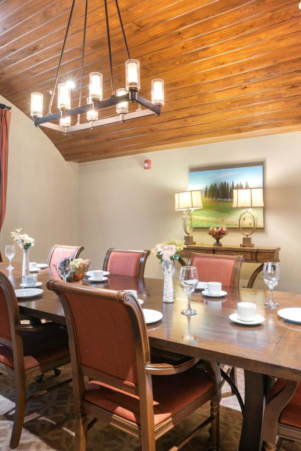 Formal dining room at Merrill Gardens at Solivita Marketplace in Kissimmee, Florida