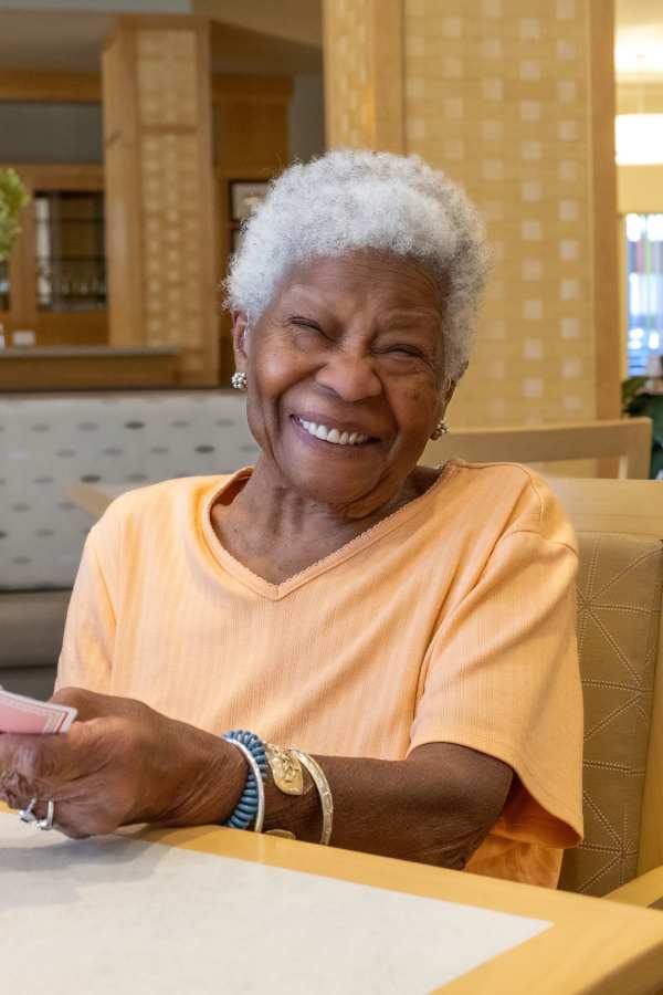 Smiling resident at Merrill Gardens at Burien in Burien, Washington