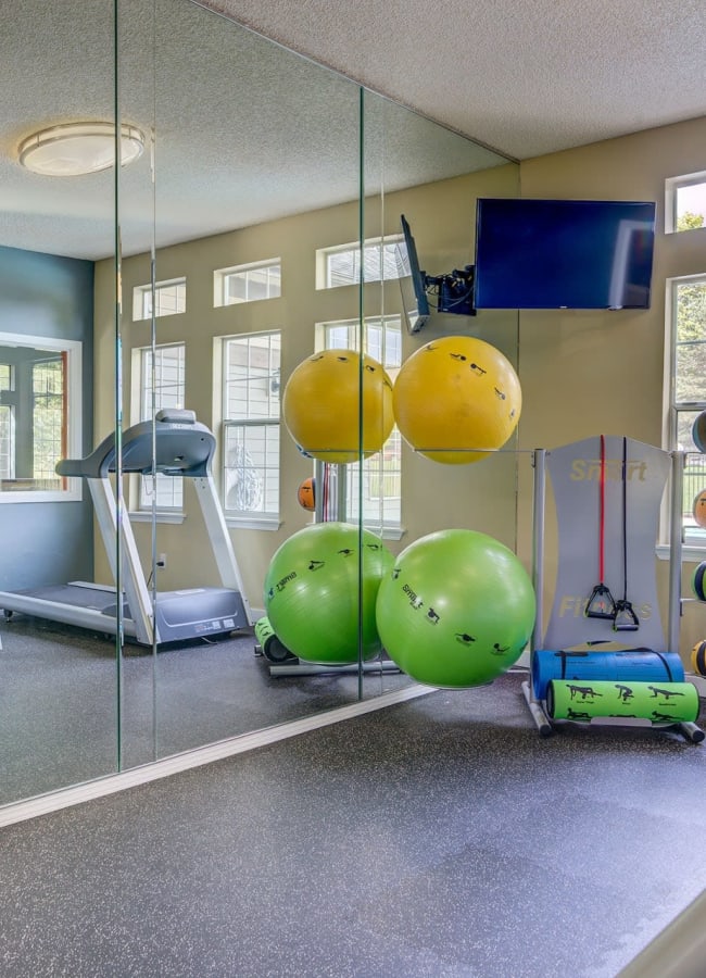 Well equipped gym at Align Apartment Homes in Federal Way, Washington