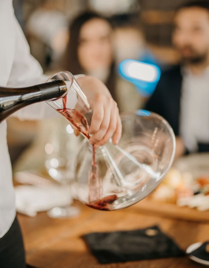 wine pouring at Woodmont Apartments in Belmont, California