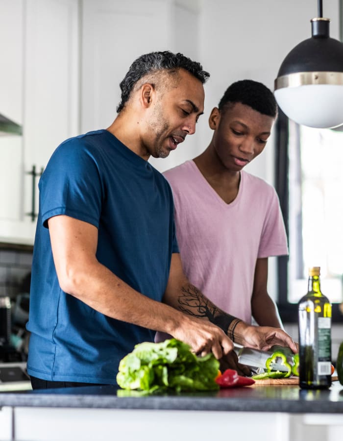 Residents preparing food at Shadow Cove Apartments in Foster City, California