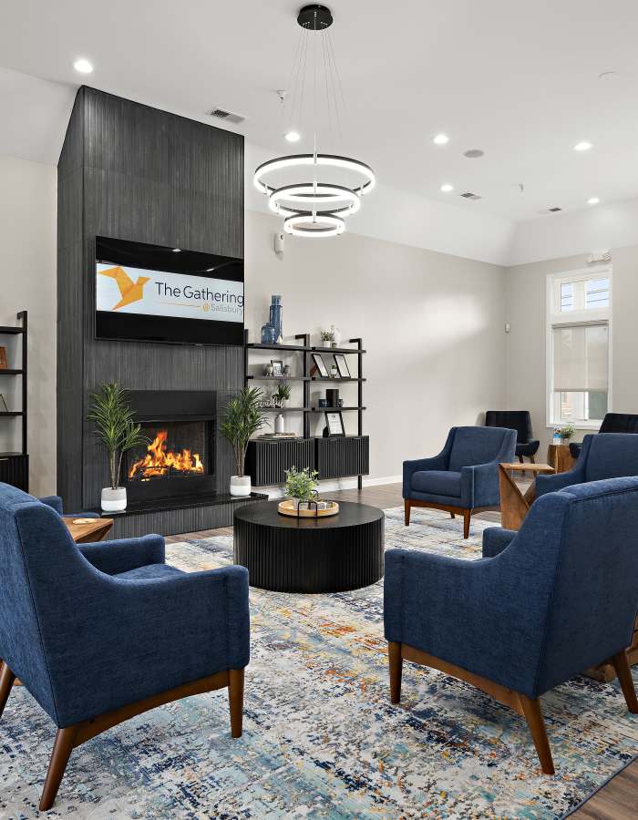Living room with sofa and recliner at The Gathering in Salisbury, Maryland