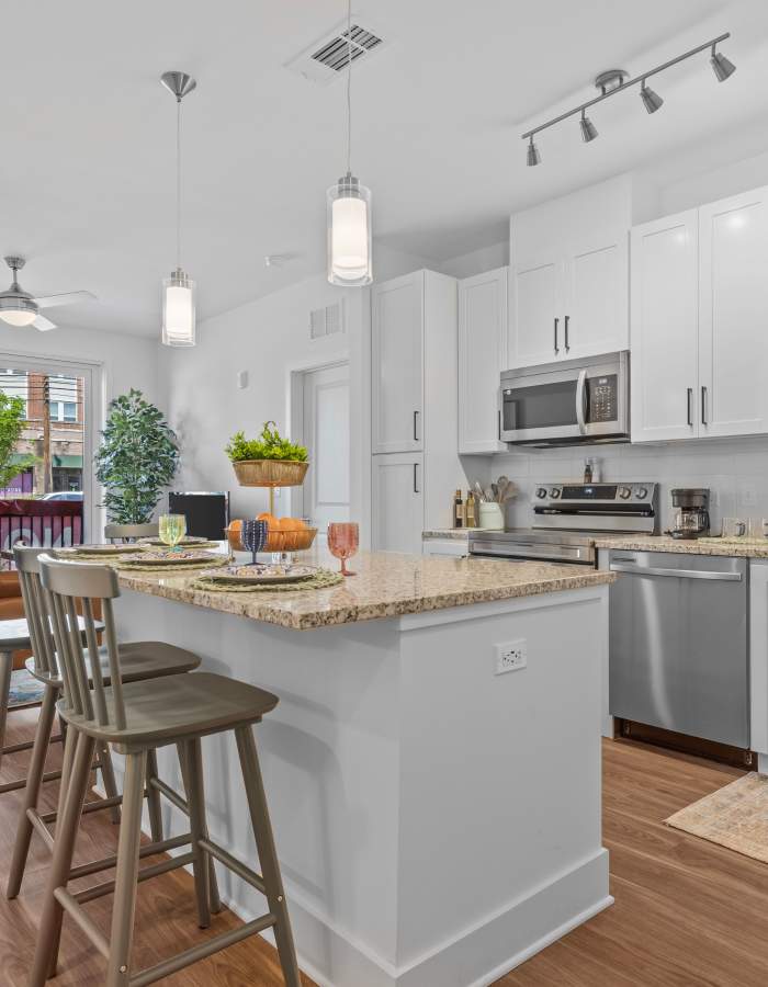 Open Kitchen with Center Island at Flats at College Park in College Park, Maryland