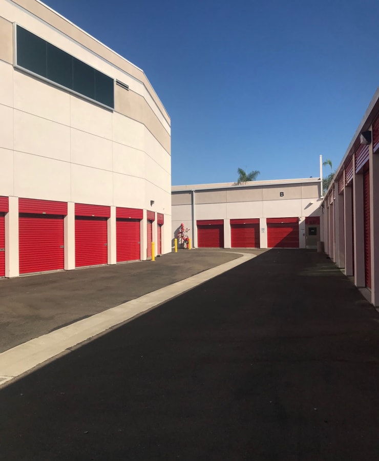 Outdoor units with red doors at StorQuest Self Storage in Carlsbad, California