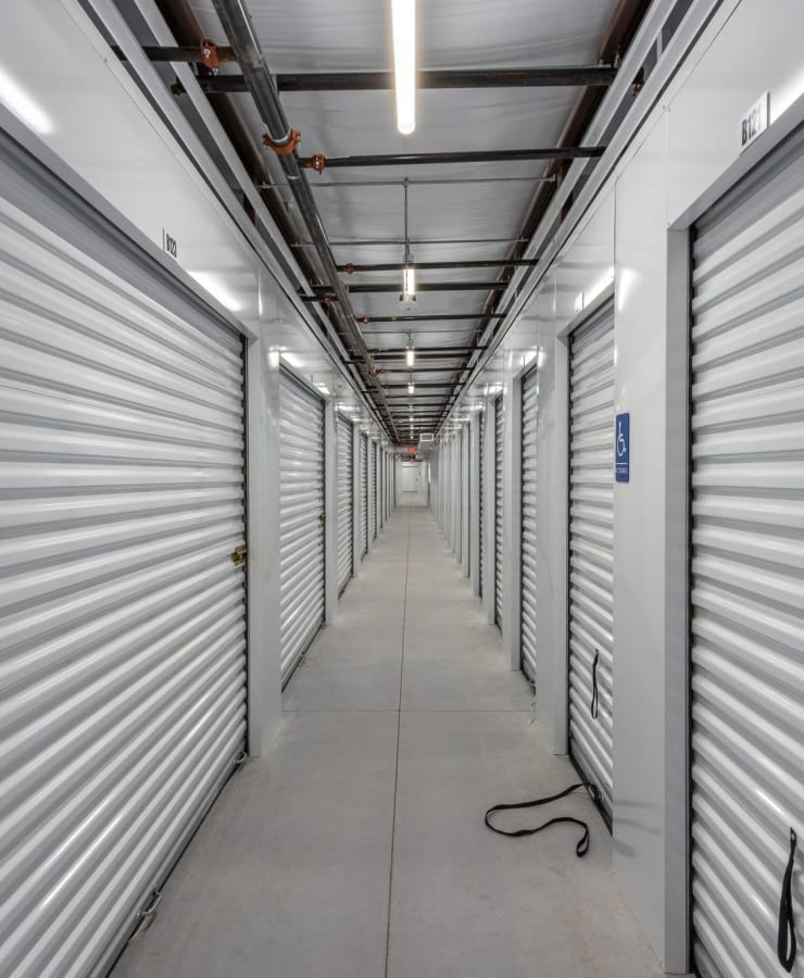 hallway lined with units at StorQuest Express Self Service Storage in Cape Coral, Florida