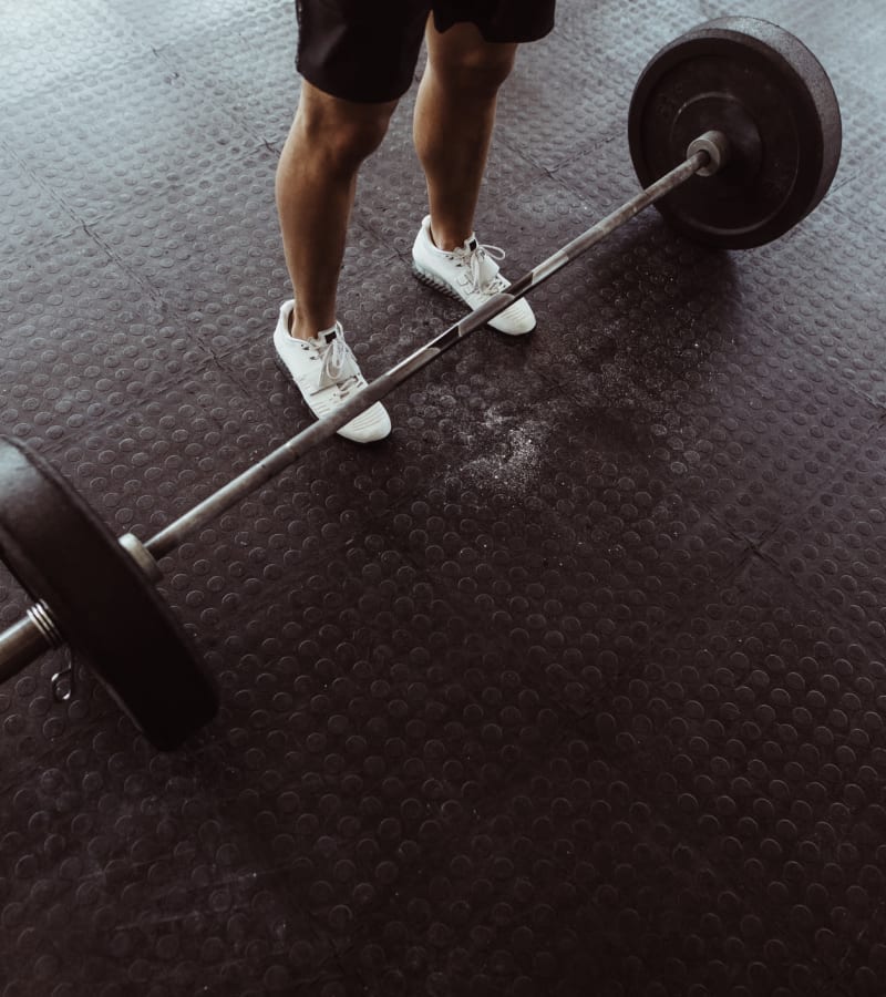 Lifting weights at Village Square Apartments in Norfolk, Virginia