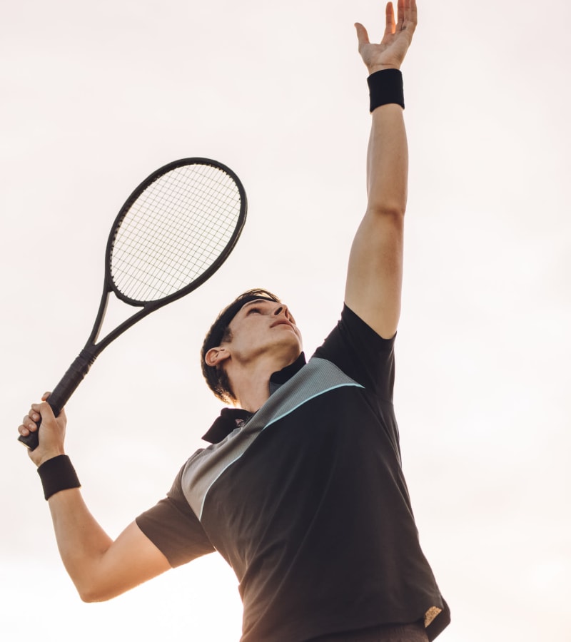 Playing tennis at Village Square Apartments in Norfolk, Virginia