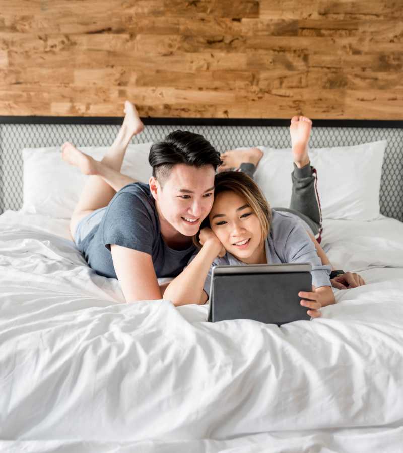 Resident couple relaxing in their home at Evergreen at River Oaks in Lake Charles, Louisiana
