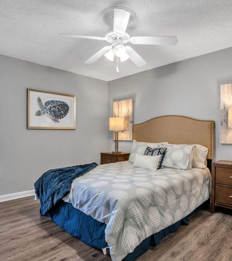 Comfy bedroom at The Canopy Apartment Villas in Orlando, Florida