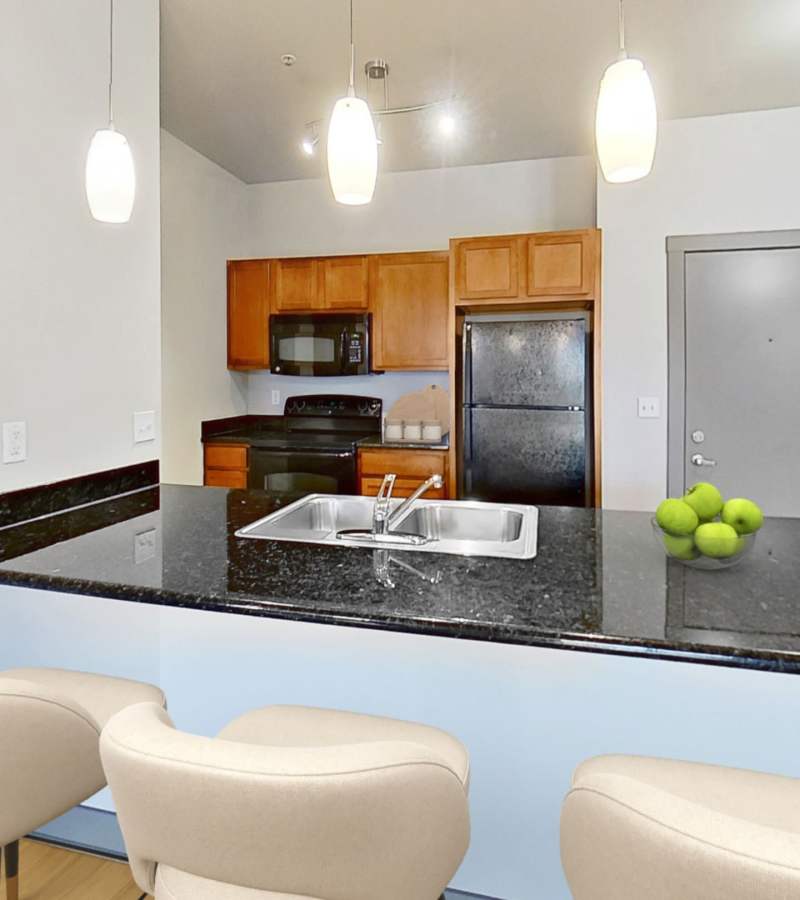 Bedroom area at Stadium District Apartments in Lansing, Michigan 