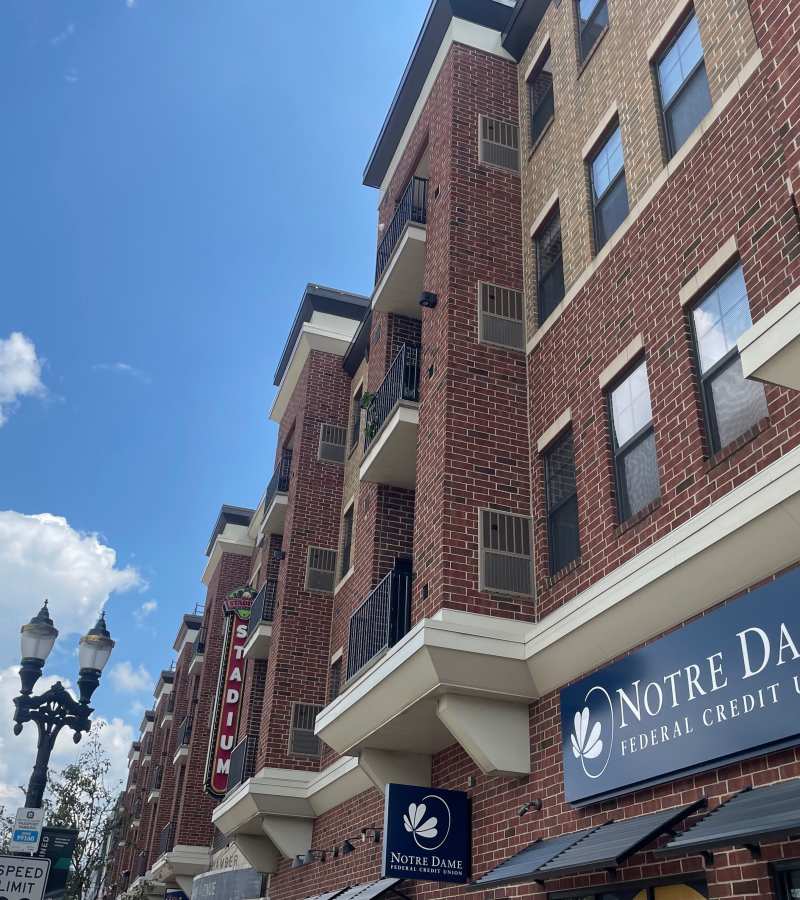 Living room area at Stadium District Apartments in Lansing, Michigan 