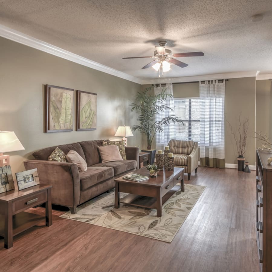 Furnished model apartment living room at The Margot on Sage in Houston, Texas