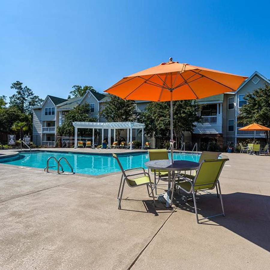 poolside covered seating at Acasă Willowbrook Apartments in Simpsonville, South Carolina