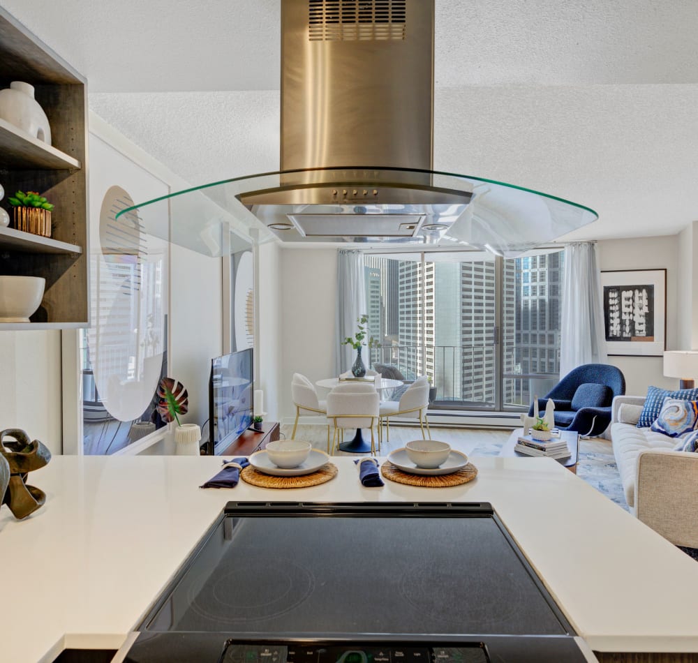 Stainless-steel appliances and an island in a model home's kitchen at Tower 801 in Seattle, Washington