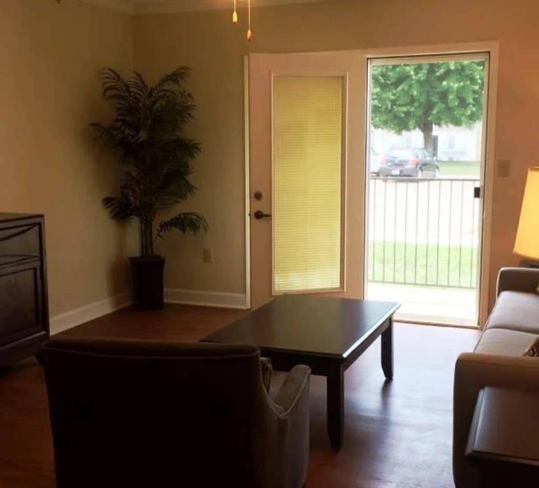 Wood-style flooring in the living room at Willow Run in Clinton, Tennessee