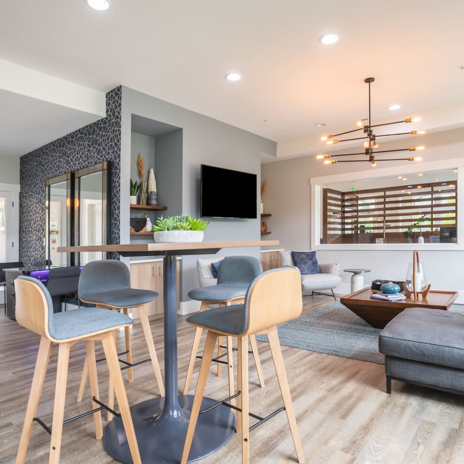 Spacious open floor plan layout with plush carpeting in a model home at Vue Issaquah in Issaquah, Washington