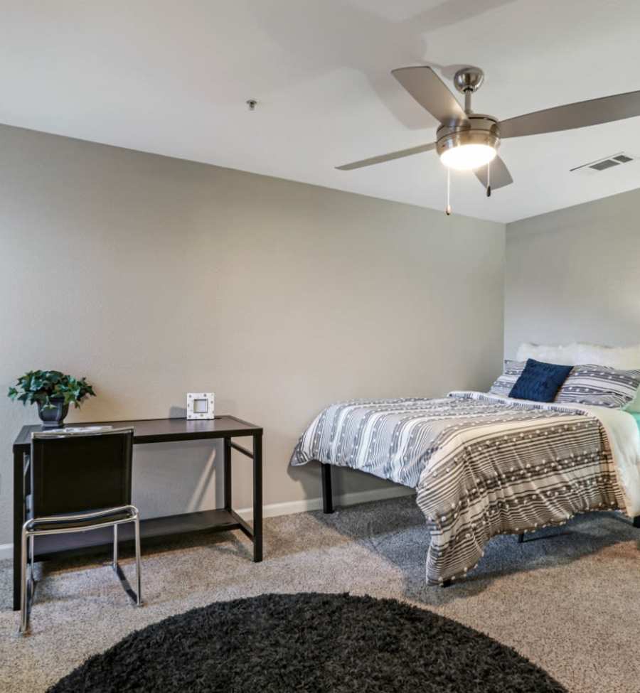 Bedroom with ceiling fan at Altitude at Baton Rouge in Baton Rouge, Louisiana