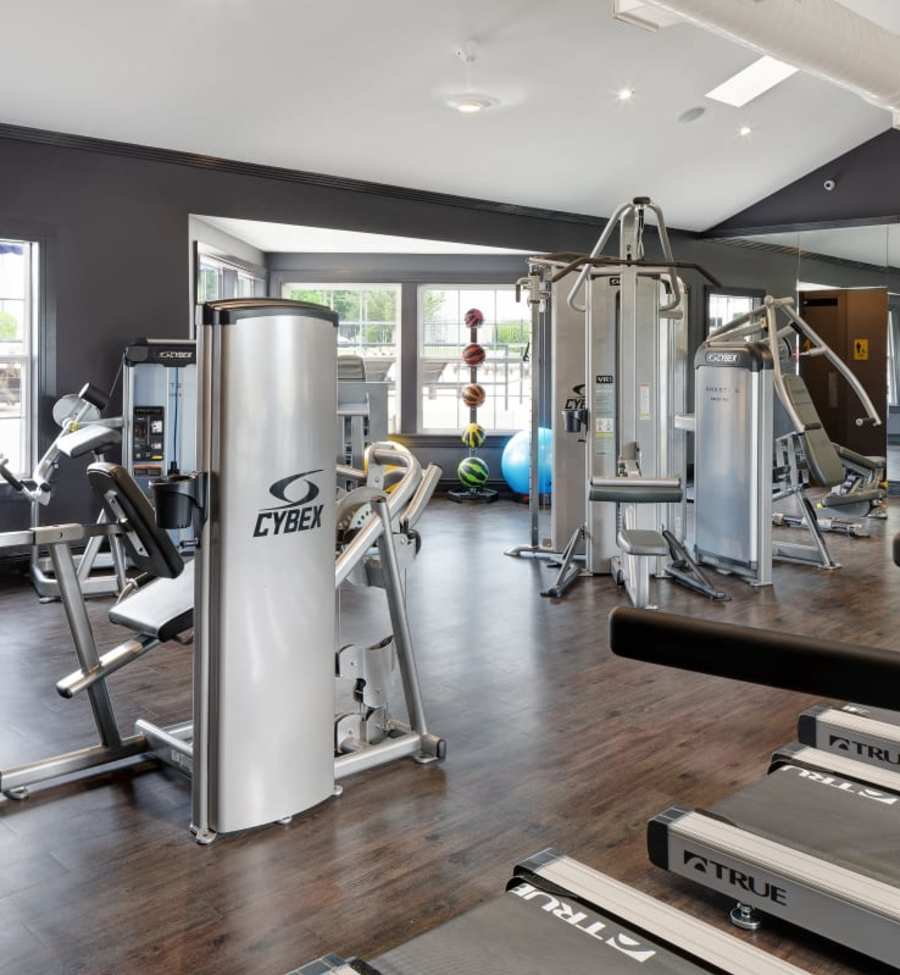 Community fitness center with plenty of weight machines at The Gramercy in Manhattan, Kansas