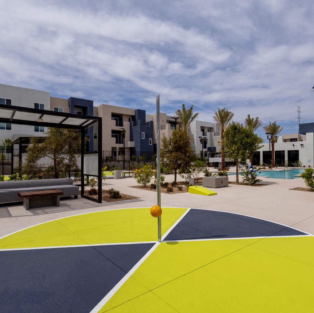 Colorful circular play area with a pole at Continuum Apartments in Las Vegas, Nevada