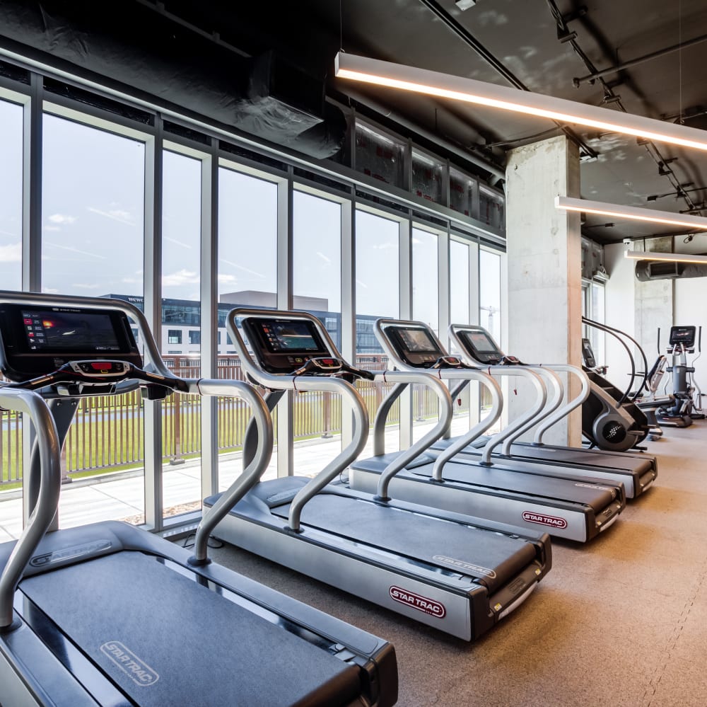Fitness center with cardio equipment at Kenect Nashville in Nashville, Tennessee