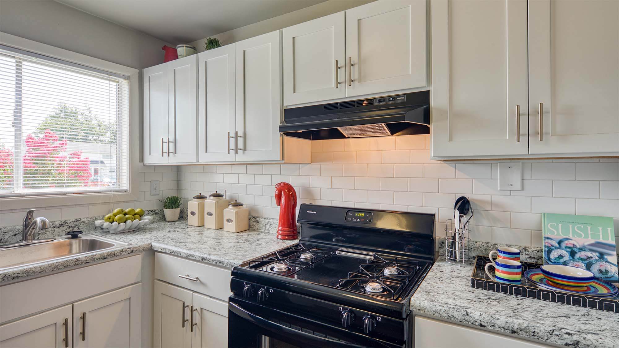 Kitchen with white cabinet at Pointe at River City in Richmond, Virginia