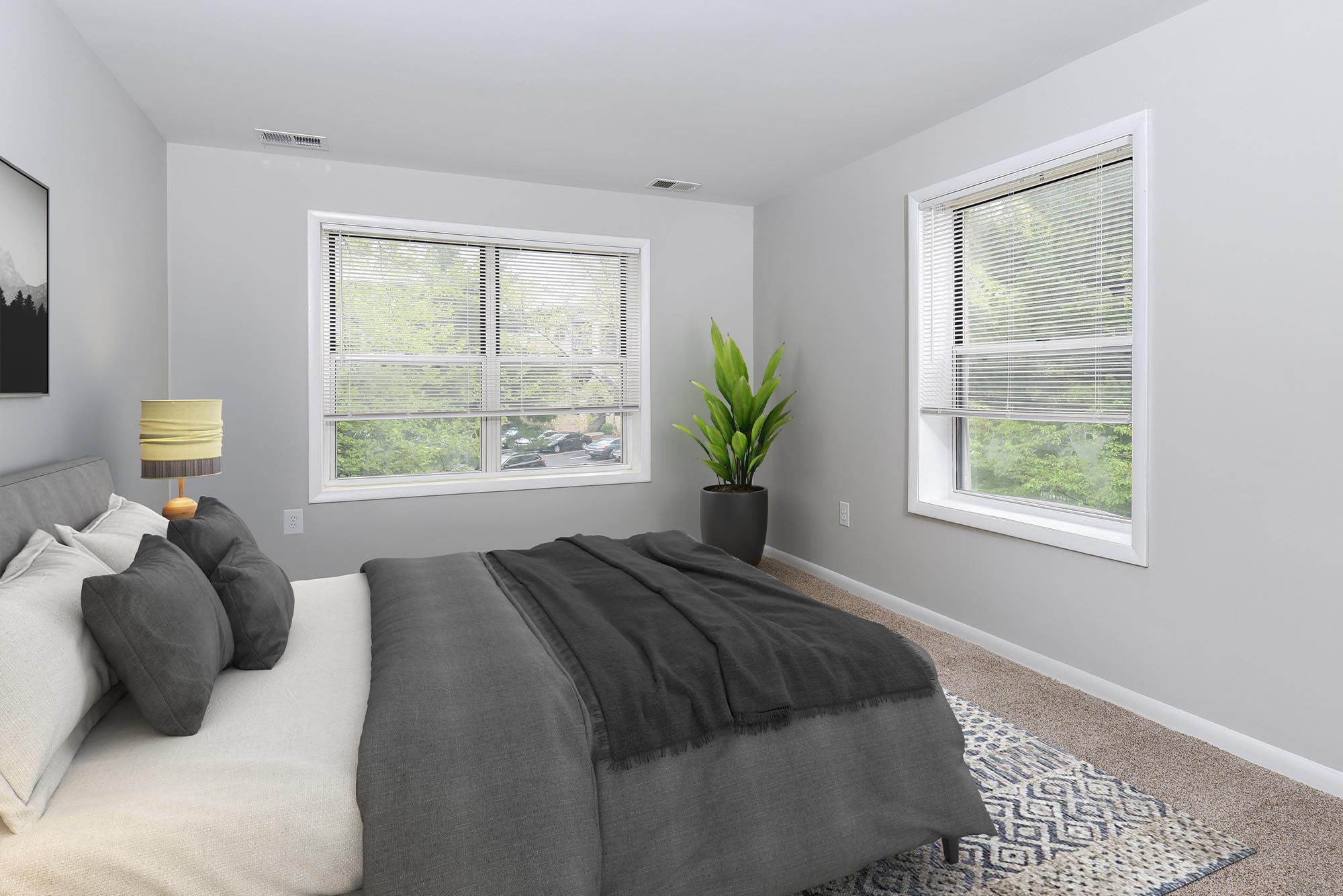 Bedroom with big window at Yorkshire Apartments in Silver Spring, Maryland