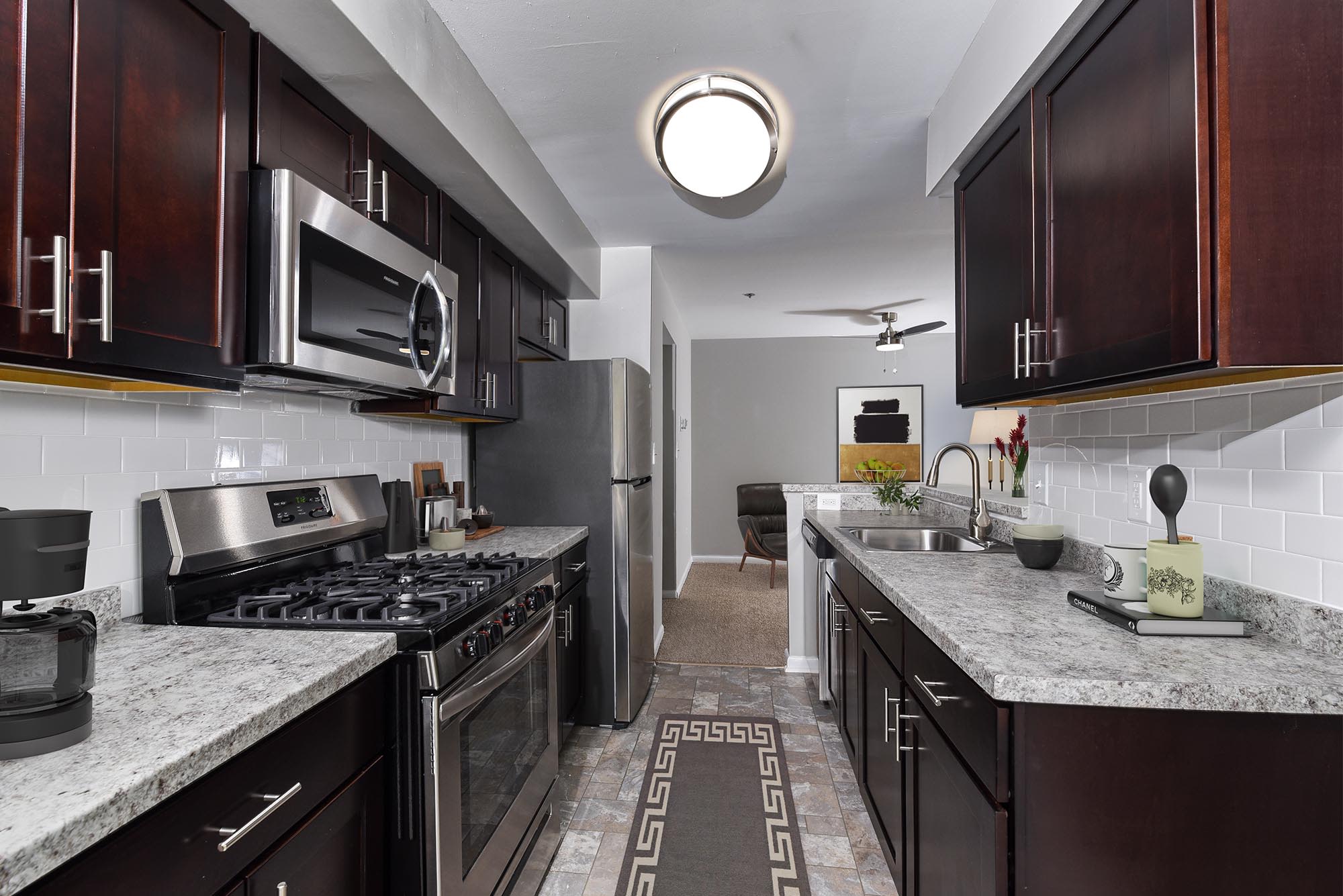 Model kitchen with appliance at Yorkshire Apartments, Silver Spring, Maryland