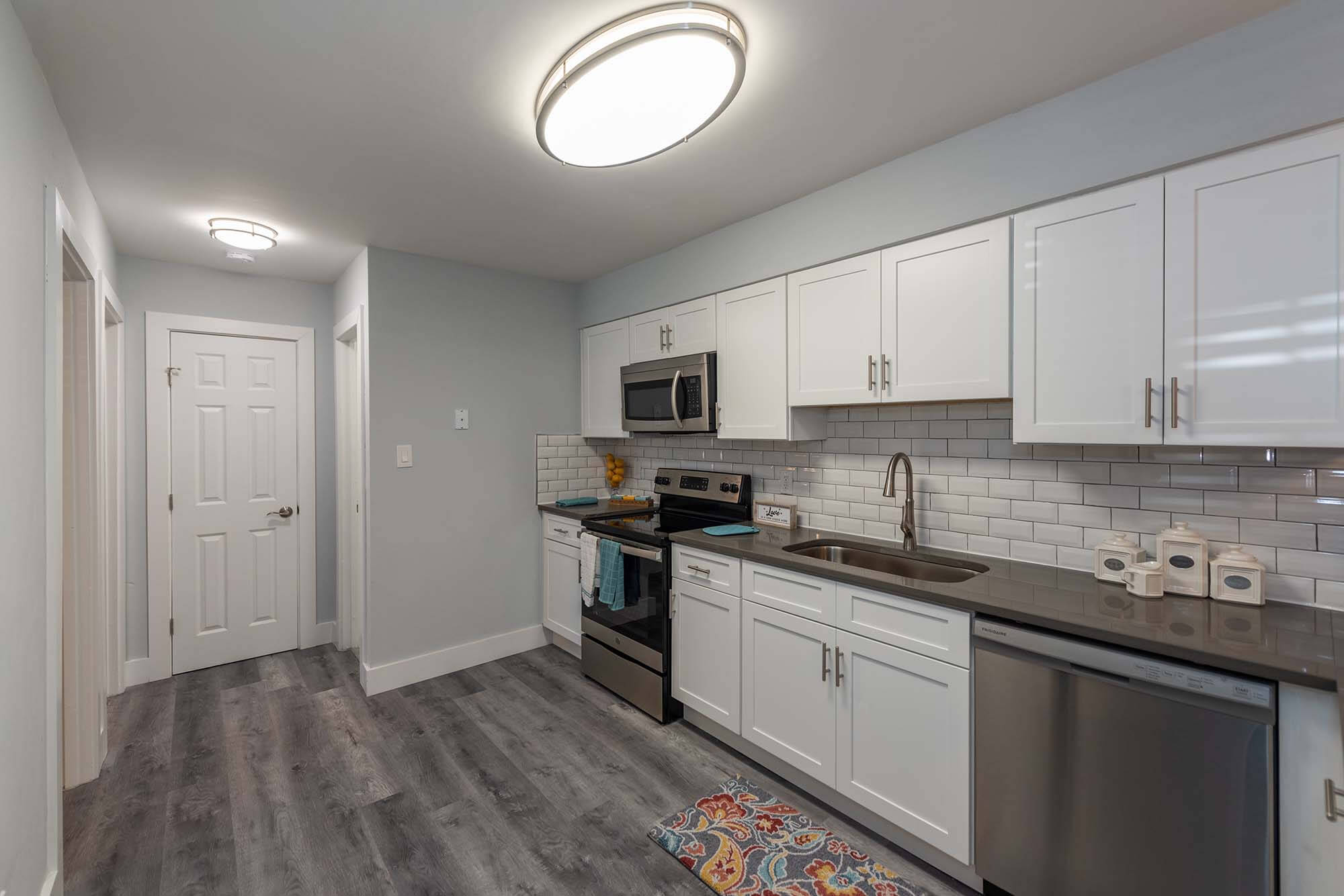Model kitchen with white cabinet at Reserves at Tidewater, Norfolk, Virginia