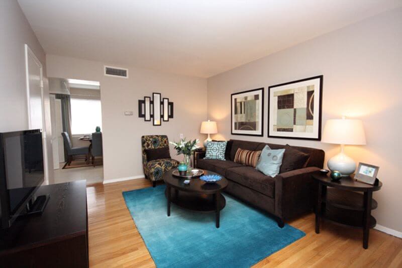 Living room with TV at James River Pointe in Richmond, Virginia