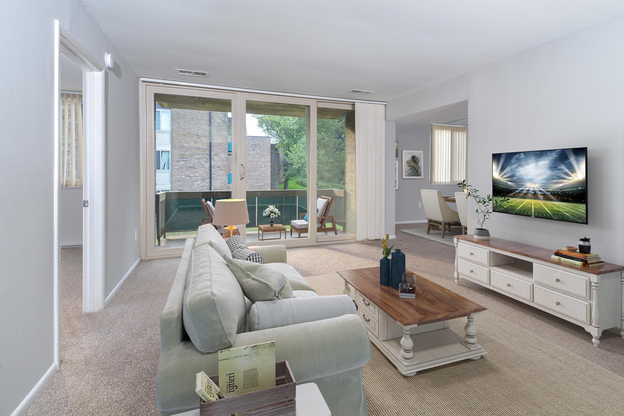 Spacious living room of a model home at Landmark Glenmont Station in Silver Spring, Maryland