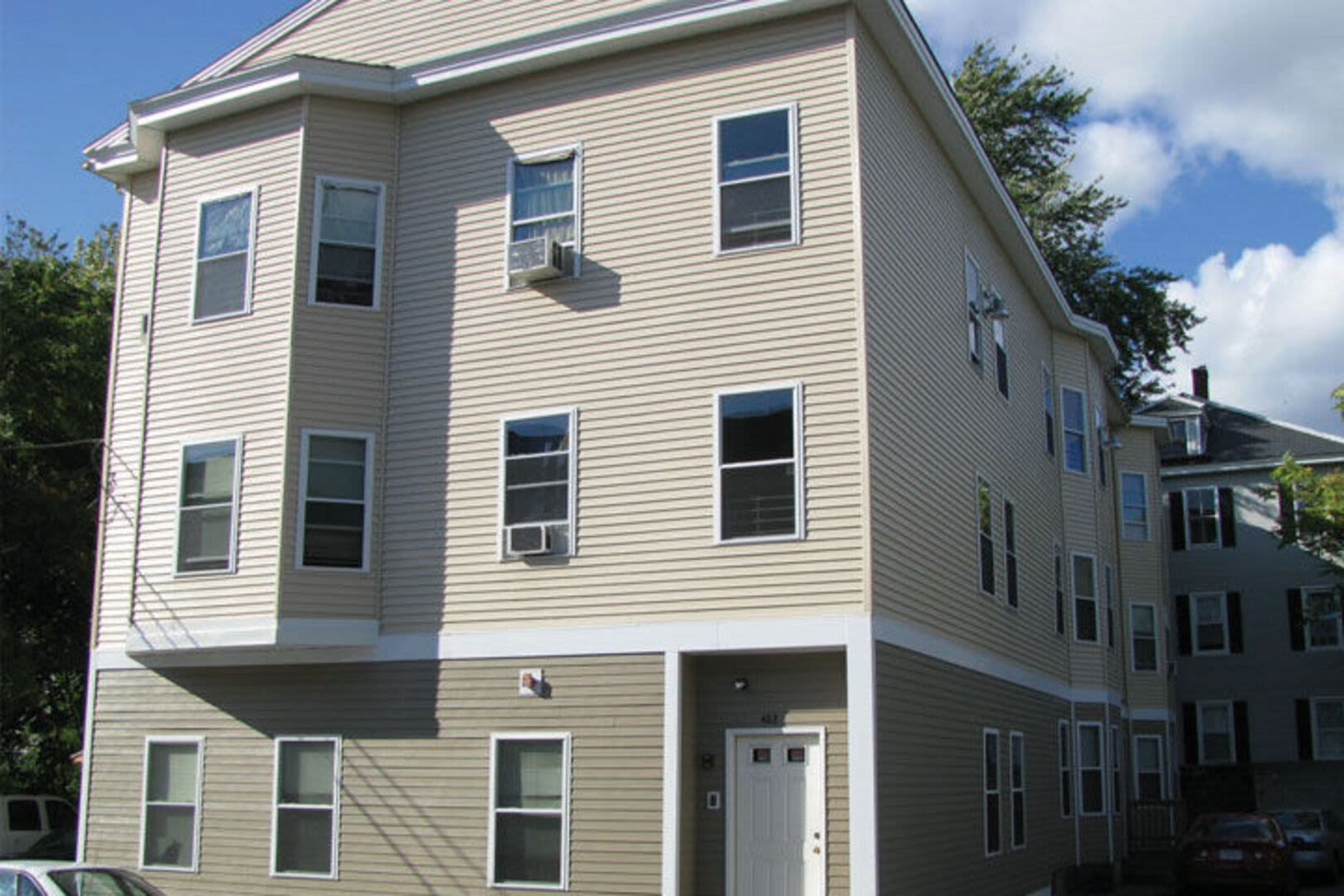 Apartment building viewed from the outside at Broadway Street Apartments in Lowell, Massachusetts