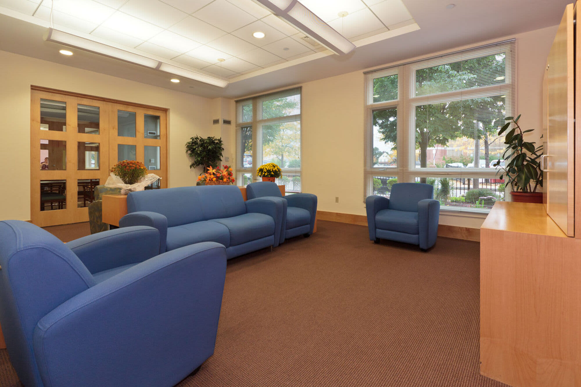 Vibrant community gathering area at Julia Martin House in Jamaica Plain, Massachusetts