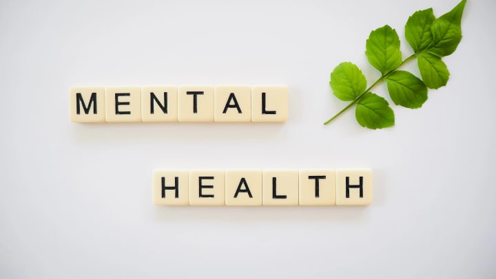 "Mental Health" spelled out in Scrabble pieces 