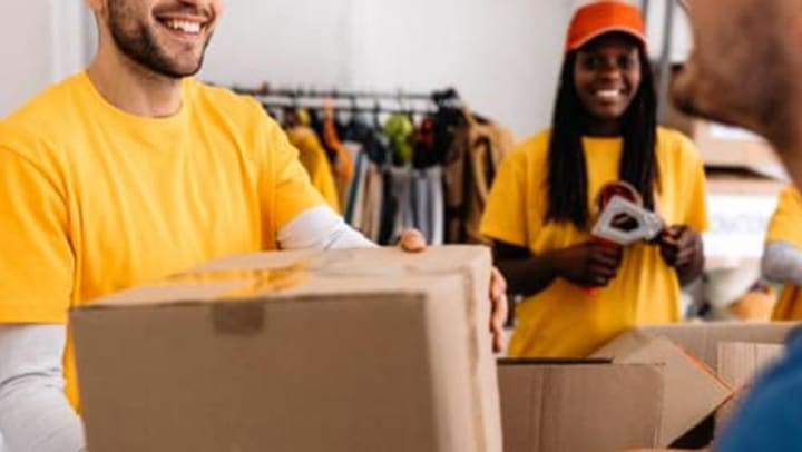 People holding packing boxes