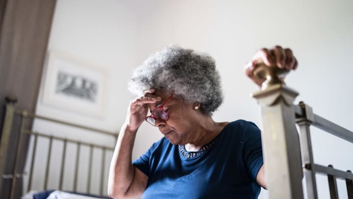 An elderly woman managing stress