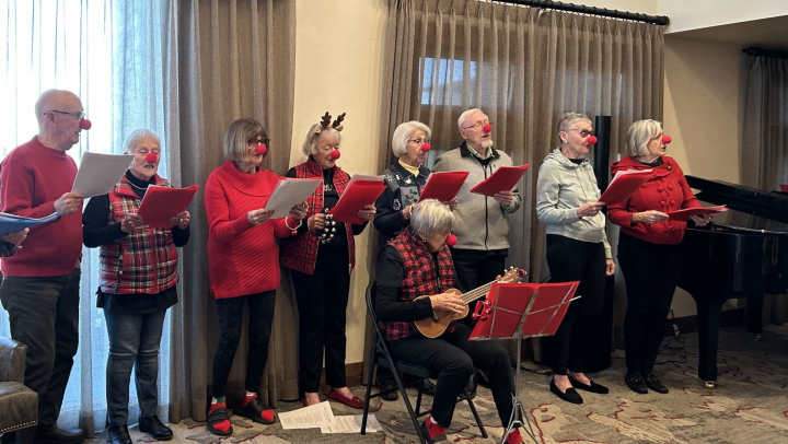 Residents singing Christmas carols