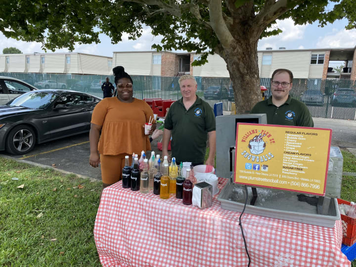 Plum Street Snowballs with a resident of Summerfield Apartment Homes