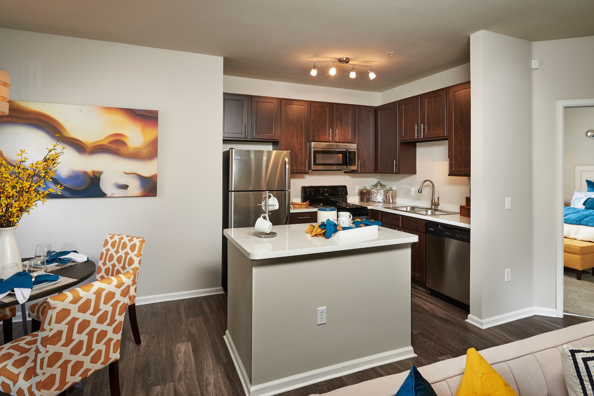 Newly renovated kitchen with espresso cabinetry at Bear Valley Park in Denver, Colorado