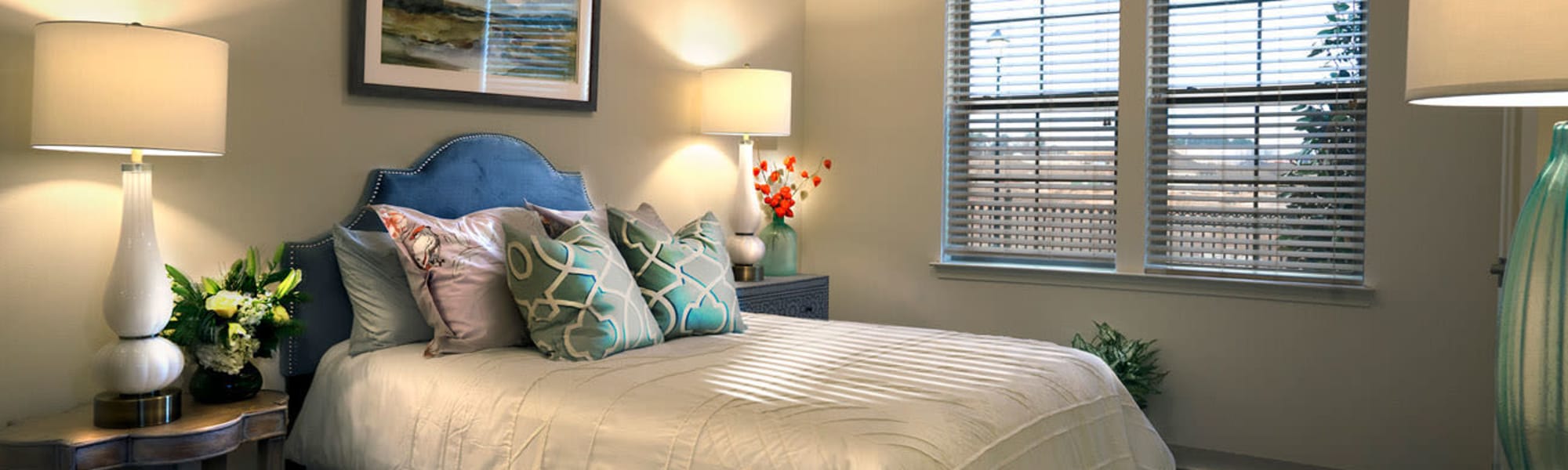 Large bed in a 1 bedroom senior apartment at The Blake at Carnes Crossroads in Summerville, South Carolina