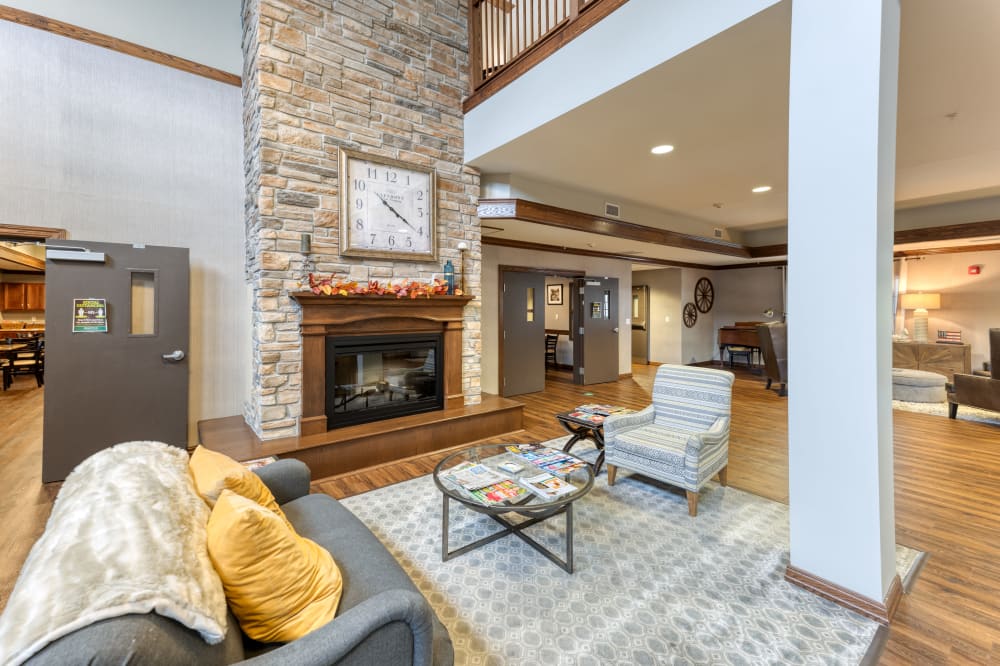 Lobby area with a fireplace at Addington Place of Shiloh in Shiloh, Illinois