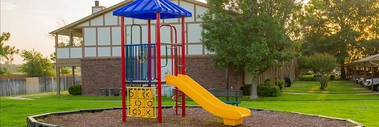 children's play structure at tulsa apartments