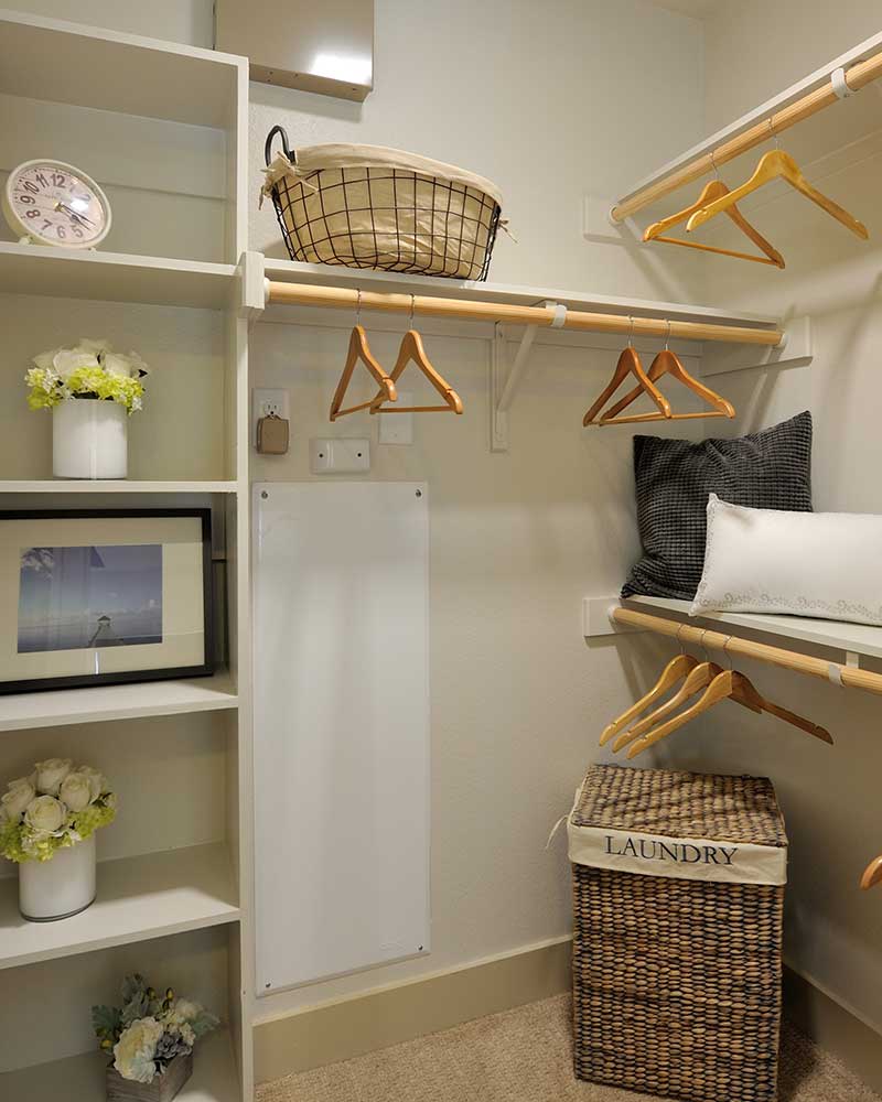 A walk-in closet at 422 At The Lake is a fashionista's dream come true.