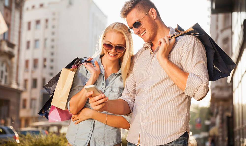 Happy couple shopping in the Buckhead district