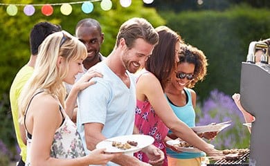 Friends enjoying a BBQ at our Austin apartments